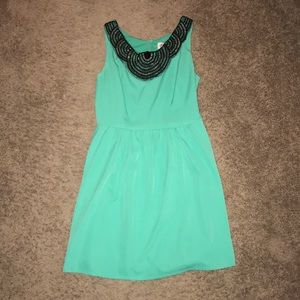 Teal dress with beaded neckline